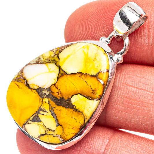 Yellow and brown marbled teardrop turquoise pendant in .925 sterling silver bezel