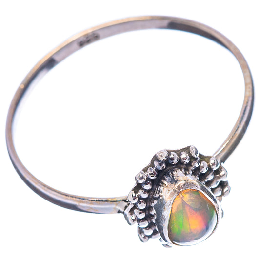 Sterling silver opal ring with oval multicolor stone, beaded halo, thin band