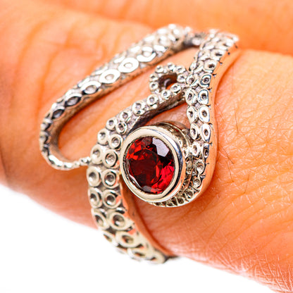 Sterling silver ring with red round gemstone and textured filigree band