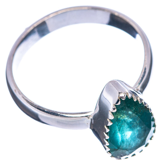 Sterling silver emerald ring, raised oval dark green stone on the band, side view