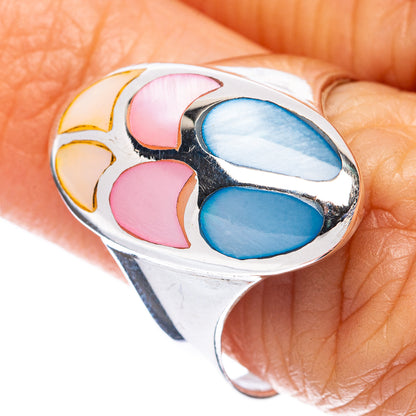 Mother-of-Pearl inlay ring in sterling silver, oval pink and blue shell insets, close-up