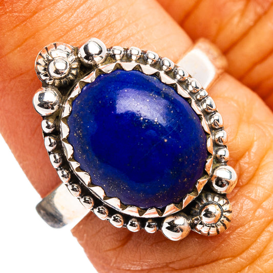 Sterling silver purpurite ring with round dark blue gemstone and beaded halo setting