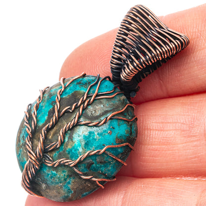 Turquoise stone pendant with oxidized copper wire wrap and tree motif