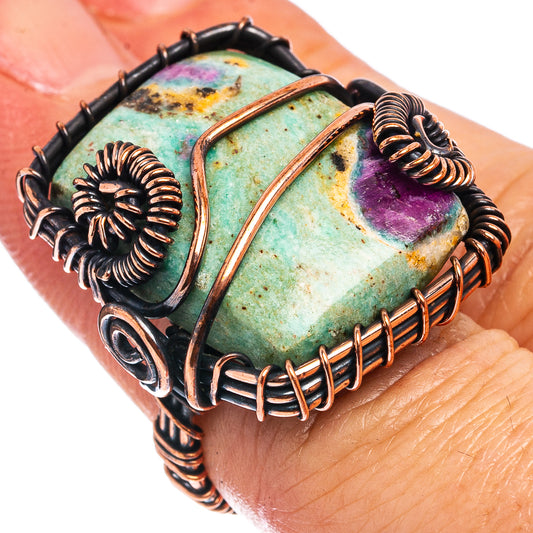 Oxidized copper wire wrap ring with green-and-purple stone cabochon
