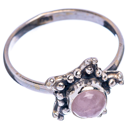Sterling silver rose quartz ring, ornate band with pink oval stone, side view