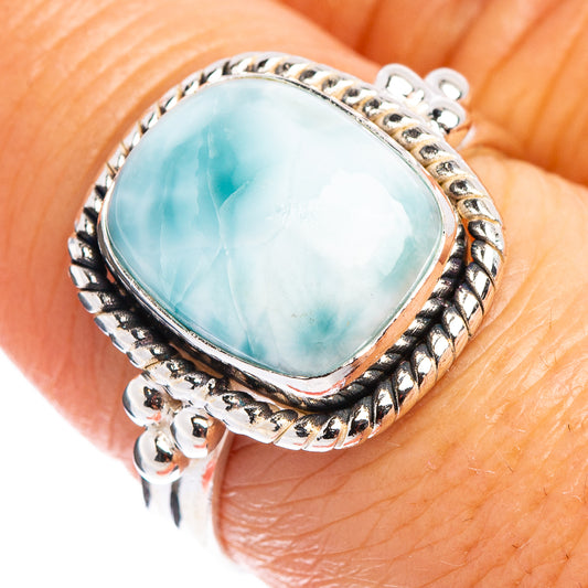 Sterling silver larimar ring with oval sky-blue stone and rope-textured bezel