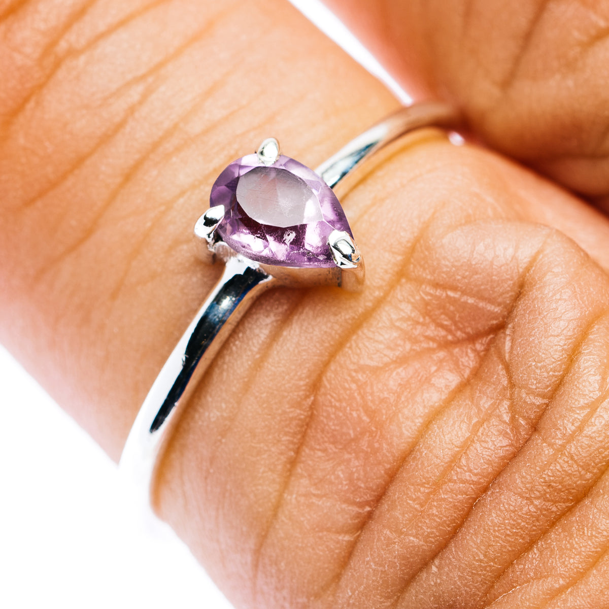 Sterling silver amethyst stackable ring with oval purple stone, three prongs