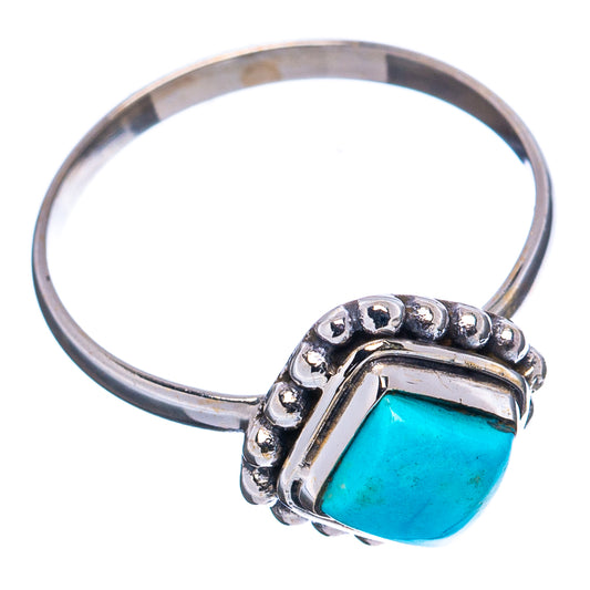 Turquoise square cabochon sterling silver ring with beaded halo setting