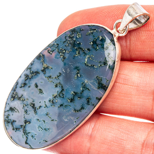 Silver-plated oval moss agate pendant with blue-green speckles, bail at top