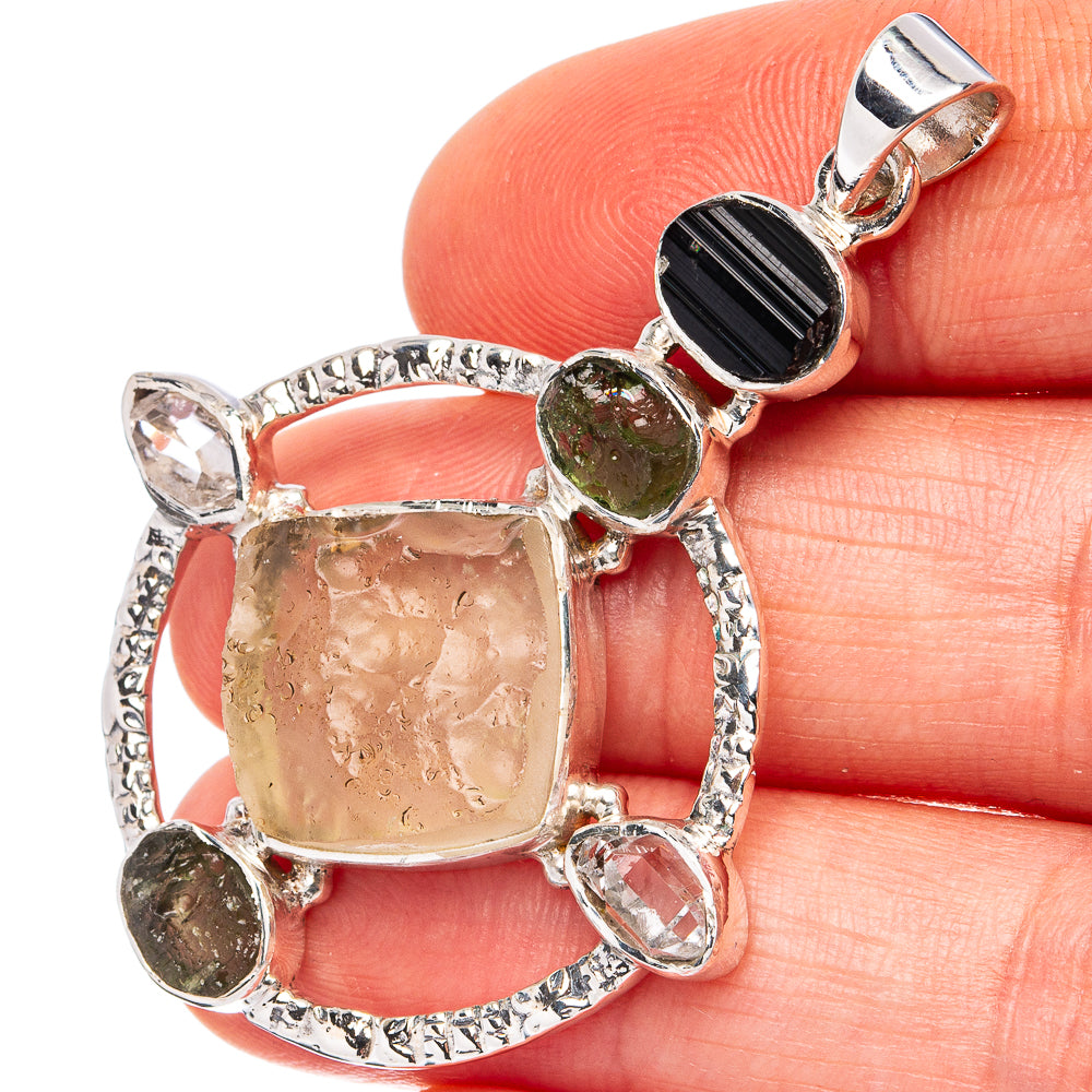 Sterling silver pendant with square desert glass, black tourmaline, peridot, and clear stones