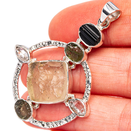Sterling silver pendant with square desert glass, black tourmaline, peridot, and clear stones