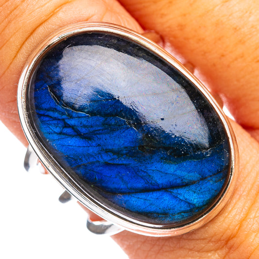 Sterling silver oval labradorite ring with blue iridescent flash, bezel setting