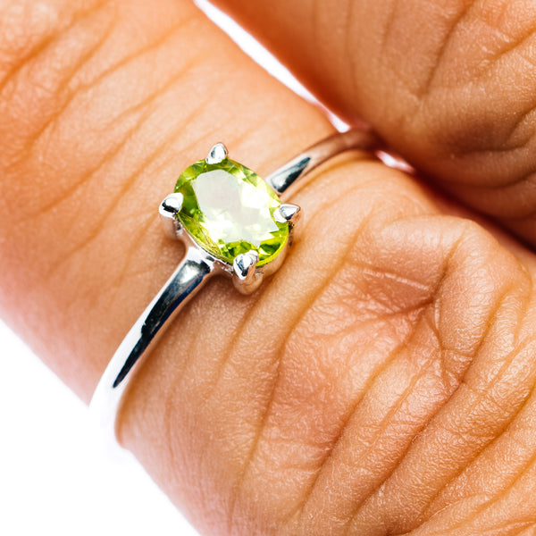 Oval peridot gemstone stackable ring in .925 sterling silver, prong-set on band