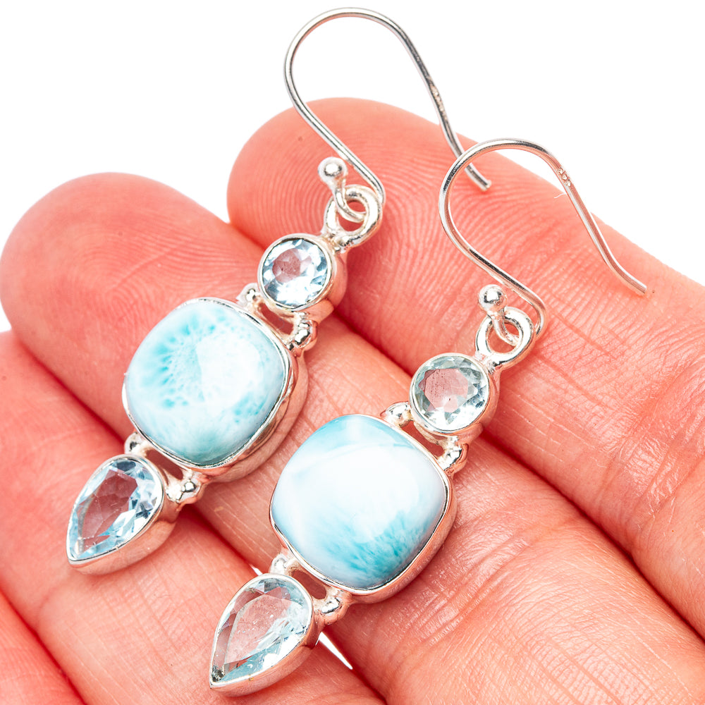 Sterling silver drop earrings with sky-blue cabochon and round blue stones, teardrop accents