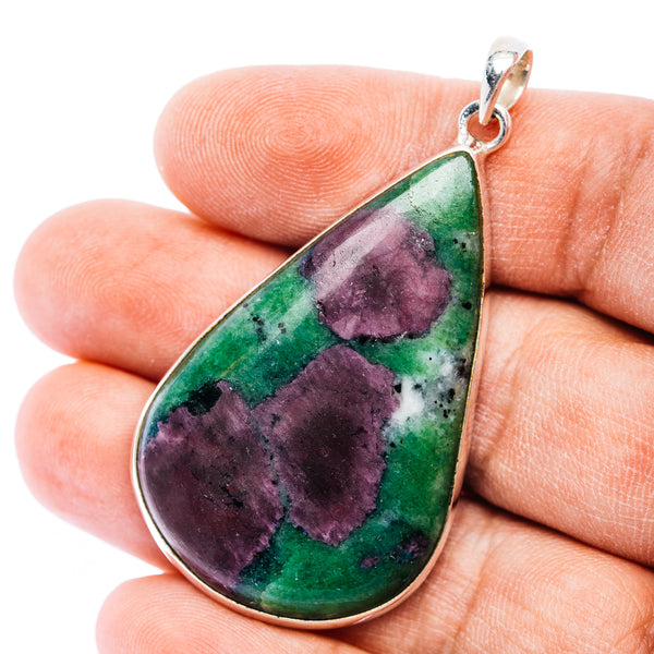 Sterling silver teardrop pendant with green and purple zoisite stone, polished bezel
