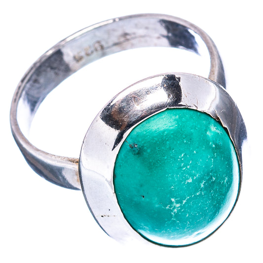 Turquoise oval stone on .925 sterling silver ring band, angled view