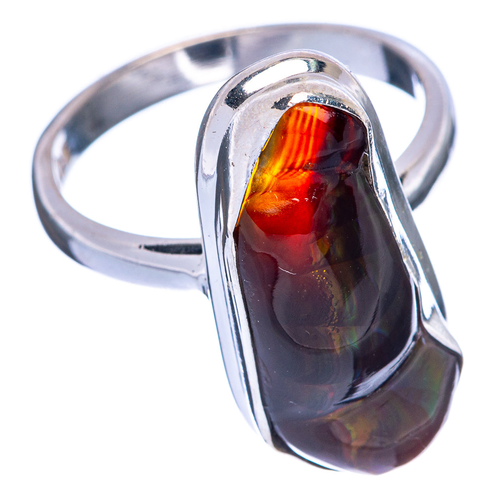 Sterling silver ring featuring dark fire agate cabochon in oval bezel, red-orange glow