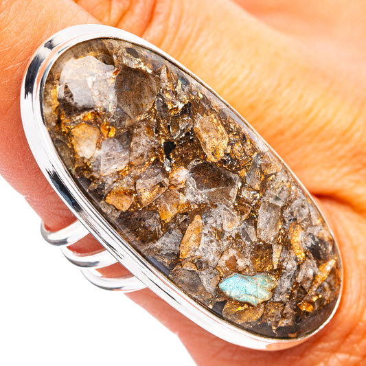 Oval .925 sterling silver ring with dark labradorite matrix stone and blue flashes
