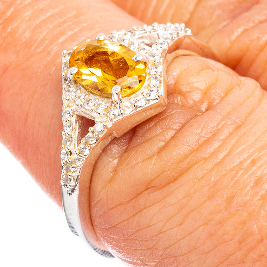 Citrine and cubic zirconia sterling silver ring on a finger