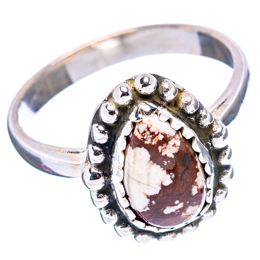 Sterling silver oval jasper ring with raised bead border and split shank, red and cream