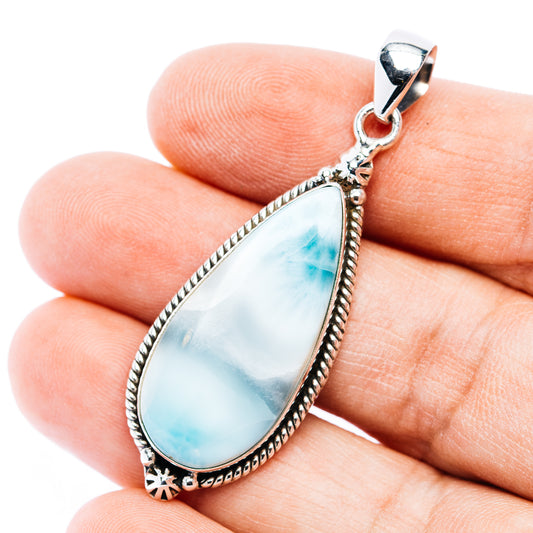 Sterling silver teardrop larimar pendant with blue stone and scalloped bezel