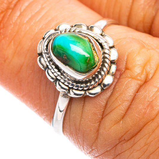 Dainty oval turquoise cabochon ring in .925 sterling silver, rope border setting