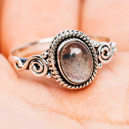Dainty oval labradorite sterling silver ring with rope bezel and spiral scroll settings