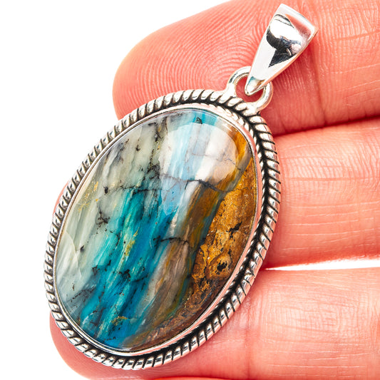 Sterling silver oval opal pendant with blue-green stone and rope-edge bezel