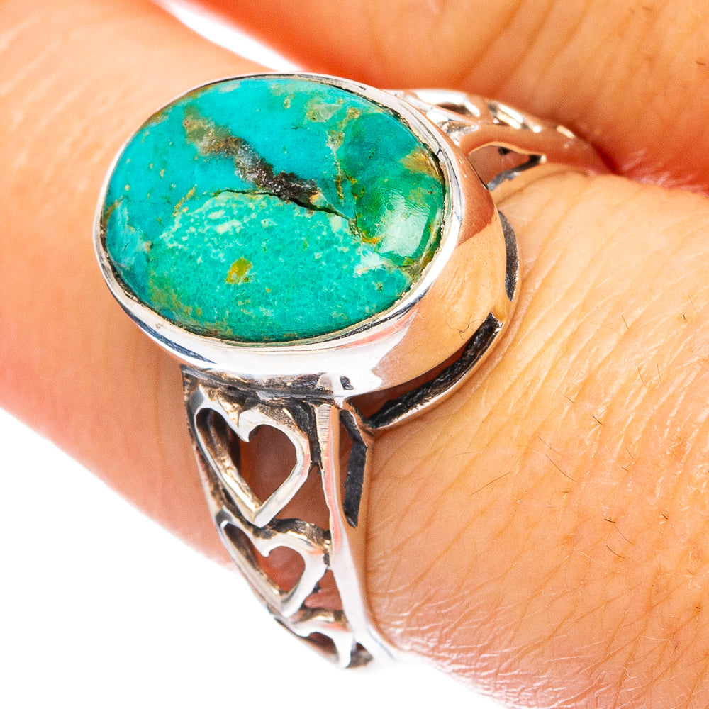 Sterling silver turquoise cabochon ring with heart cutout side detail
