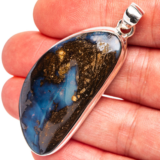 Sterling silver boulder opal pendant with teardrop bezel, blue and black stone with gold flecks