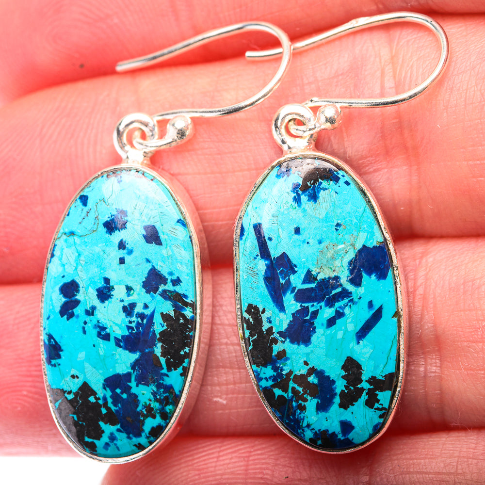 Shattuckite earrings with oval turquoise-blue stone in silver bezel, fishhook dangles