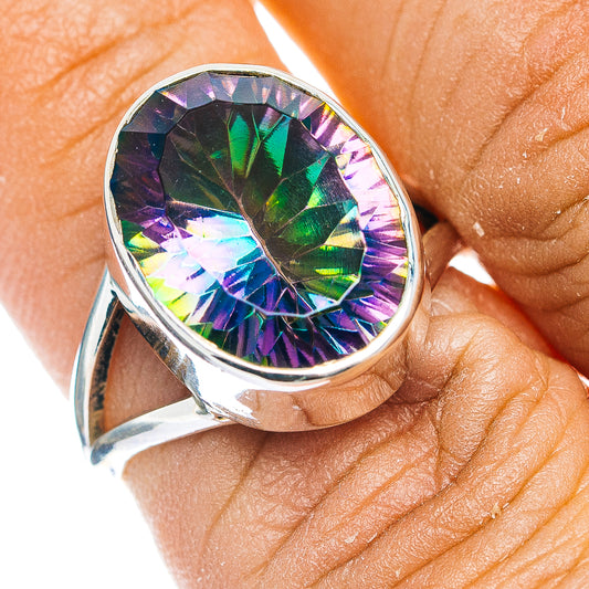 Sterling silver ring with oval faceted iridescent gemstone, dark multi-color center, size 6.75