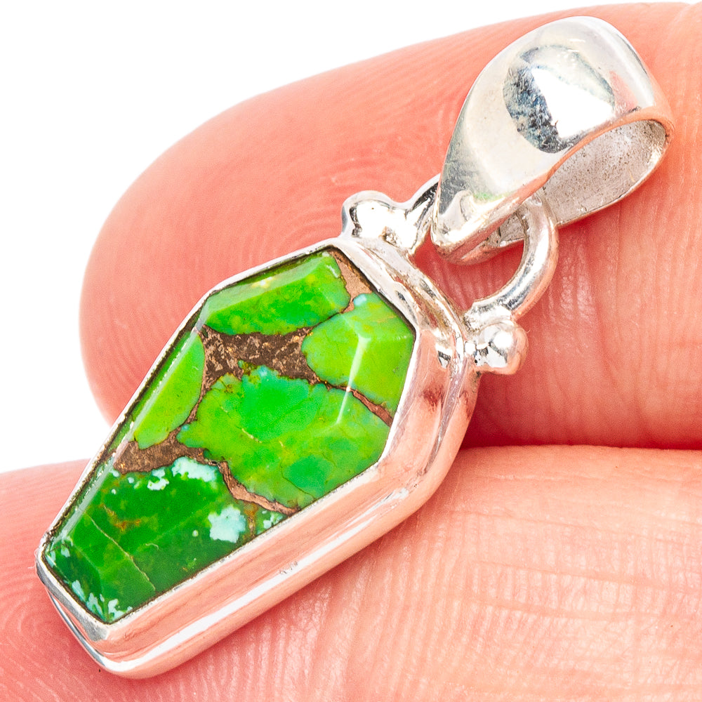 Green turquoise pendant with copper-toned stone and 925 sterling silver setting
