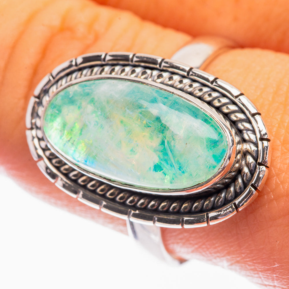 Oval green gemstone ring with 925 sterling silver bezel, braided edge and wide patterned band