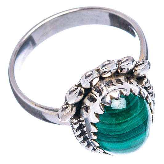 Sterling silver ring with oval malachite stone and bead-set floral side detail, size 6.5