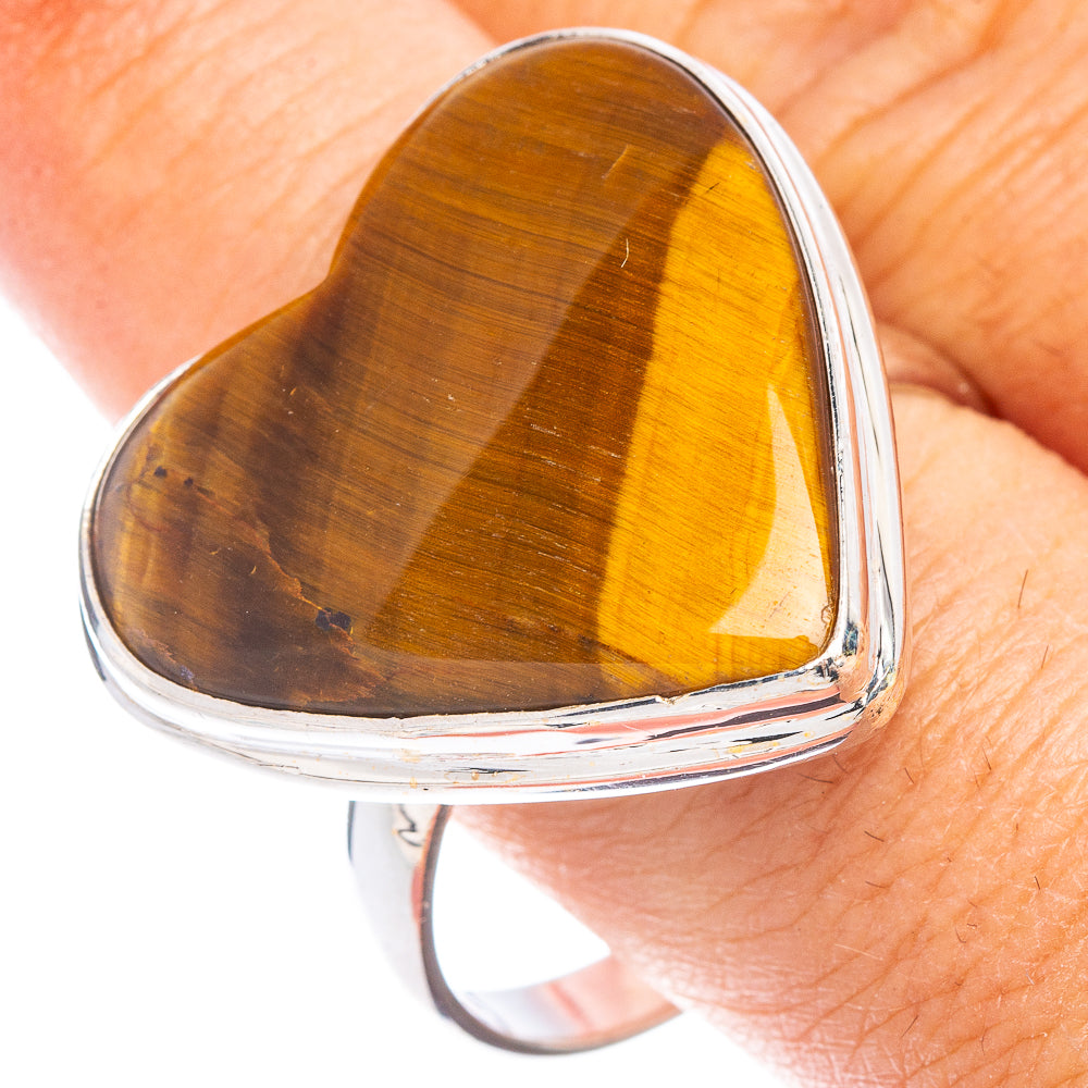 Heart-shaped tiger eye ring with sterling silver band, smooth polished setting