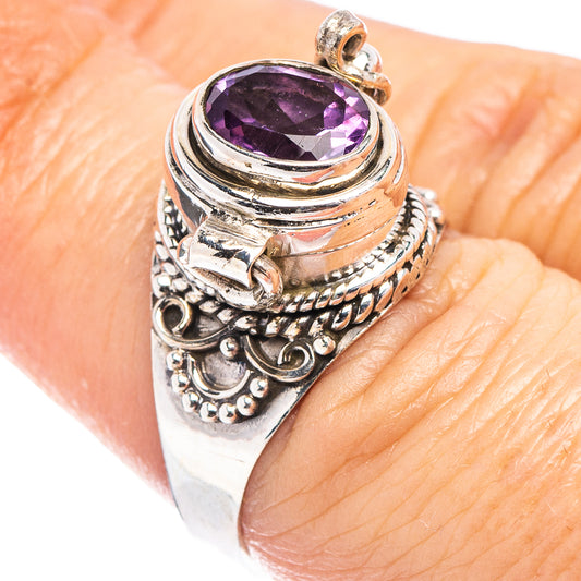 Sterling silver ring with round amethyst centerpiece and ornate beaded band
