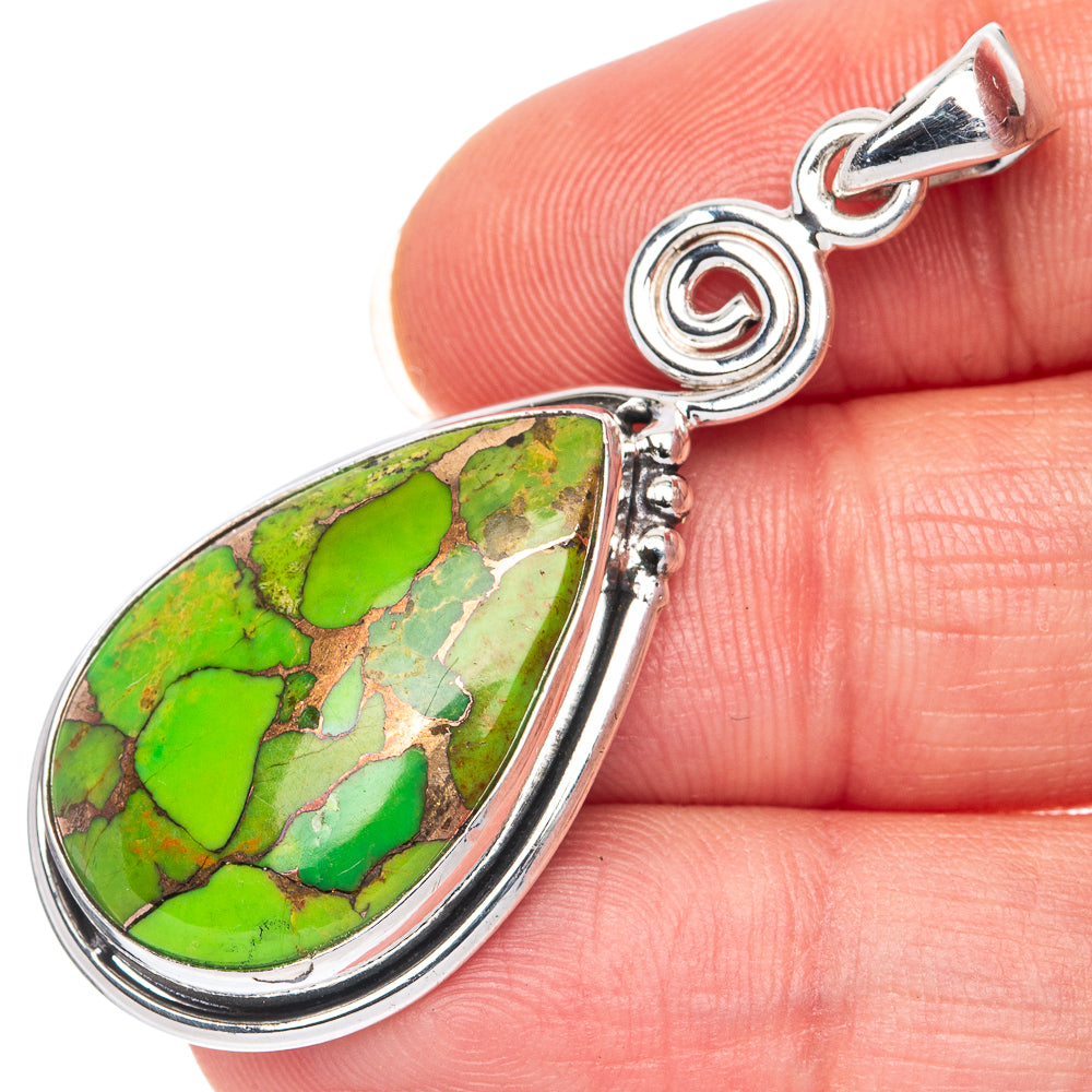 Silver teardrop pendant with green copper turquoise stone and curled bail