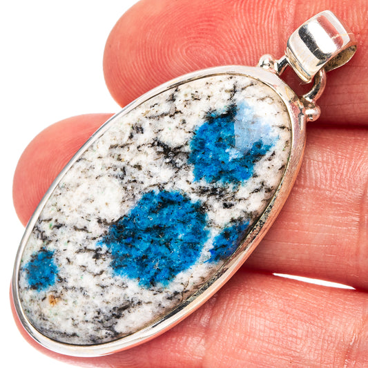 Sterling silver pendant with oval azurite stone, blue and white veined center