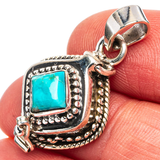 Sterling silver turquoise poison-style pendant with blue stone and engraved border