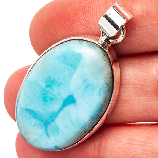 Larimar oval pendant in .925 sterling silver with light blue stone and bail loop