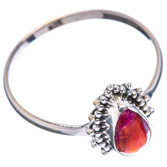 Sterling silver ring with oval gemstone and textured beaded prong setting, side view