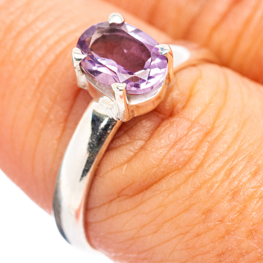 Amethyst sterling silver ring with oval purple gemstone and four-prong setting