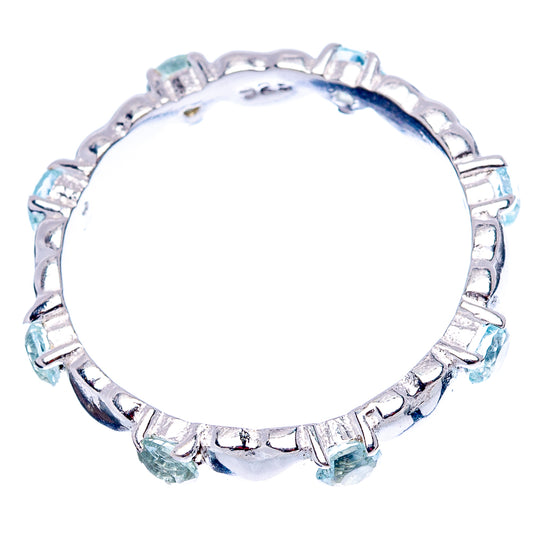 925 sterling silver dainty ring with blue topaz stones, round top view
