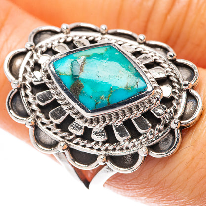 Sterling silver ring with rectangular turquoise gemstone and scalloped filigree band