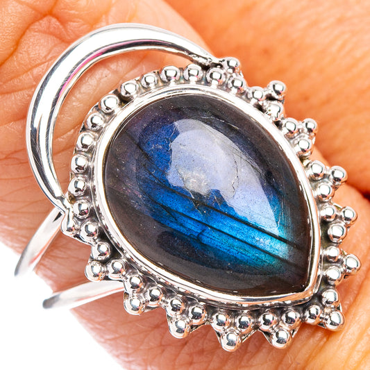 Sterling silver labradorite ring with oval blue flash stone and beaded halo setting