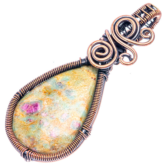 Oxidized copper wire wrap pendant with oval green stone and pink flecks, full design
