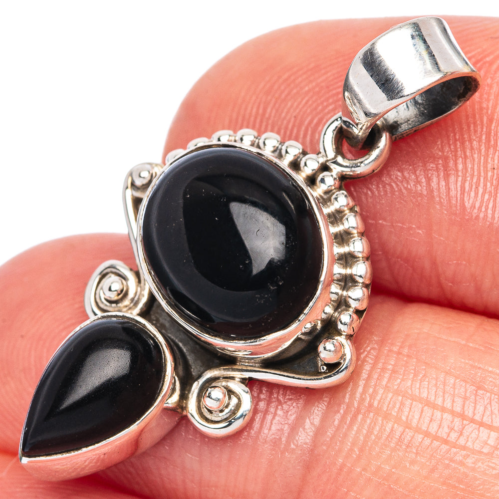 Sterling silver black onyx pendant with round cabochon and teardrop drop charm