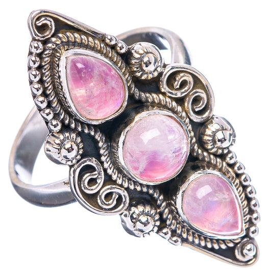 Sterling silver ring with three pink teardrop moonstones in ornate settings