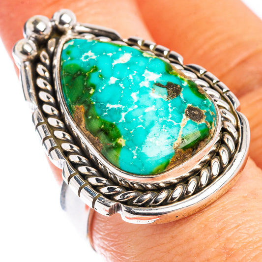 Sterling silver ring with oval turquoise cabochon and braided bezel